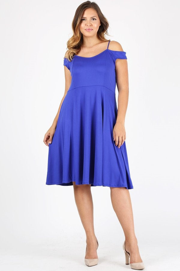 Plus size woman wearing royal blue off-shoulder fit and flare cocktail dress