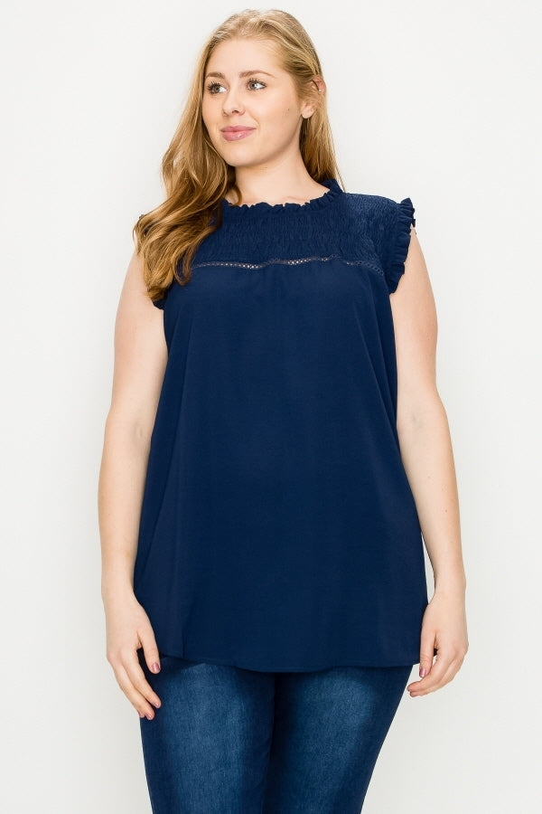 Plus size sleeveless smocked ruffle blouse in navy