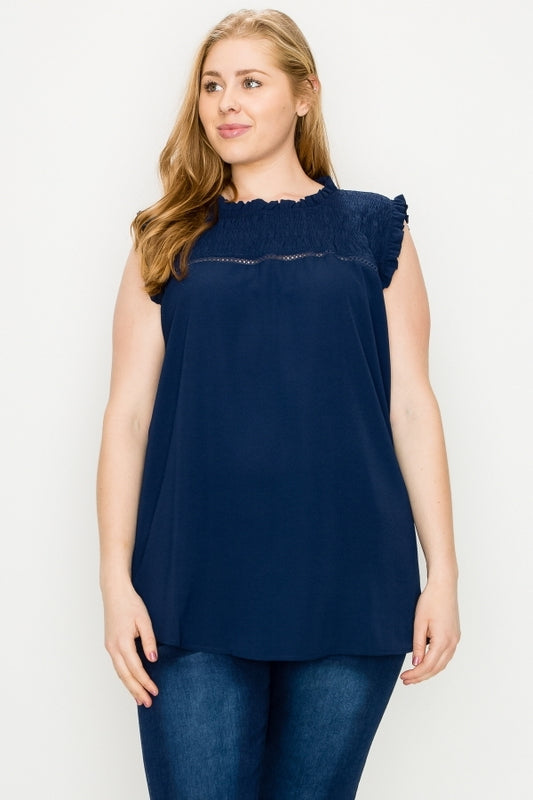 Plus size sleeveless smocked ruffle blouse in navy